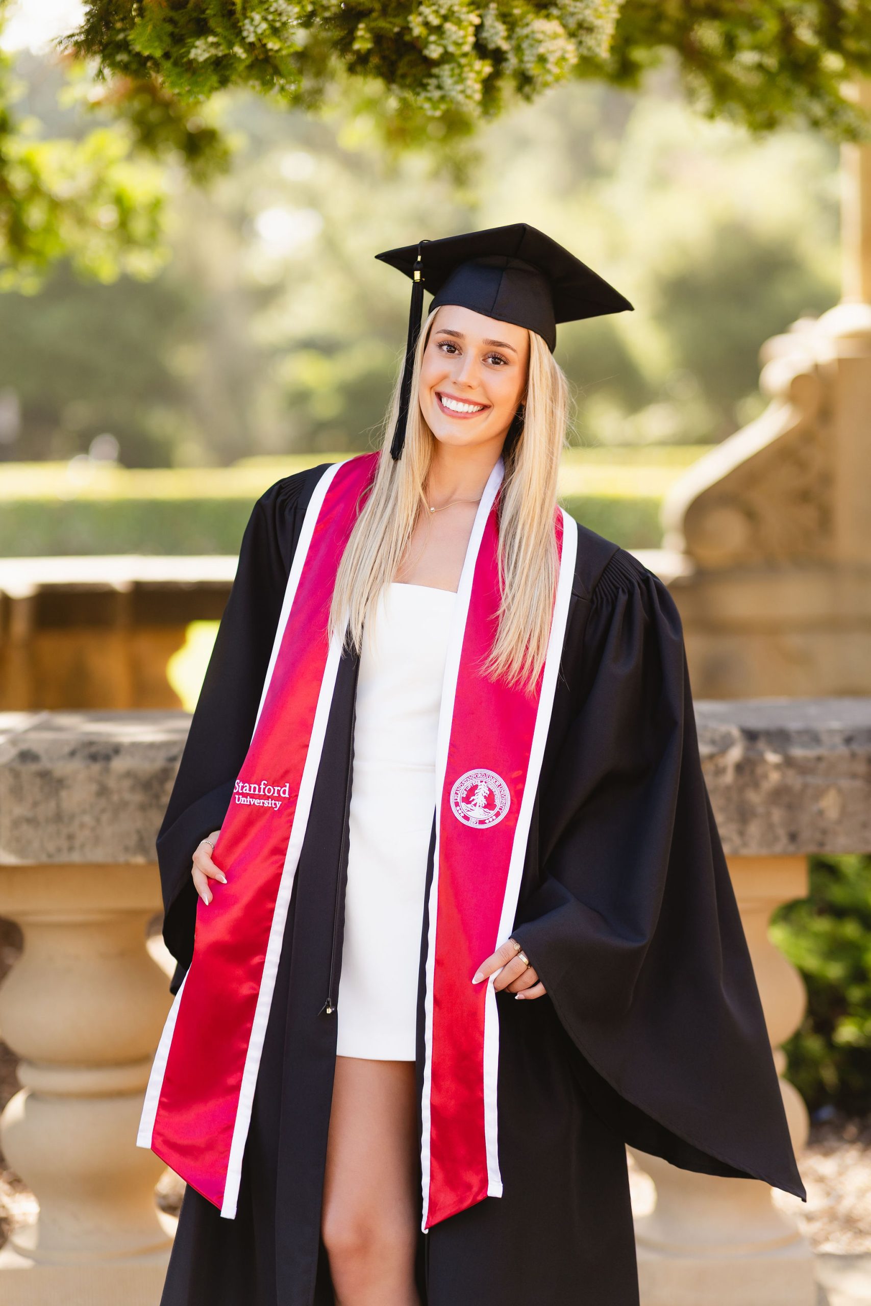 Stanford College Graduation Photo graduate wearing cap and gown